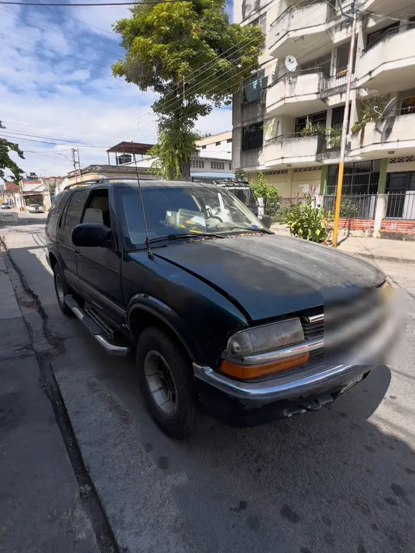 Chevrolet Blazer verde: frente antes, en Monster Garage Vzla