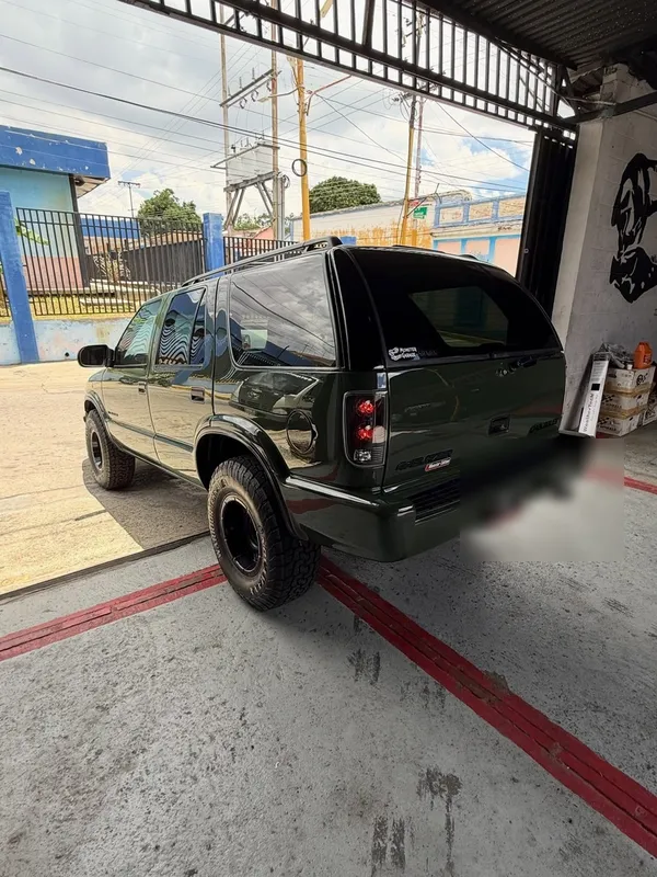 Chevrolet Blazer verde: trasera después, en Monster Garage Vzla, Valencia