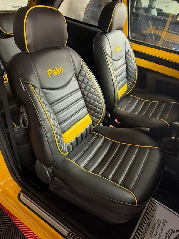 Fiat Palio negro y amarillo en Monster Garage Vzla, Valencia (foto 10)