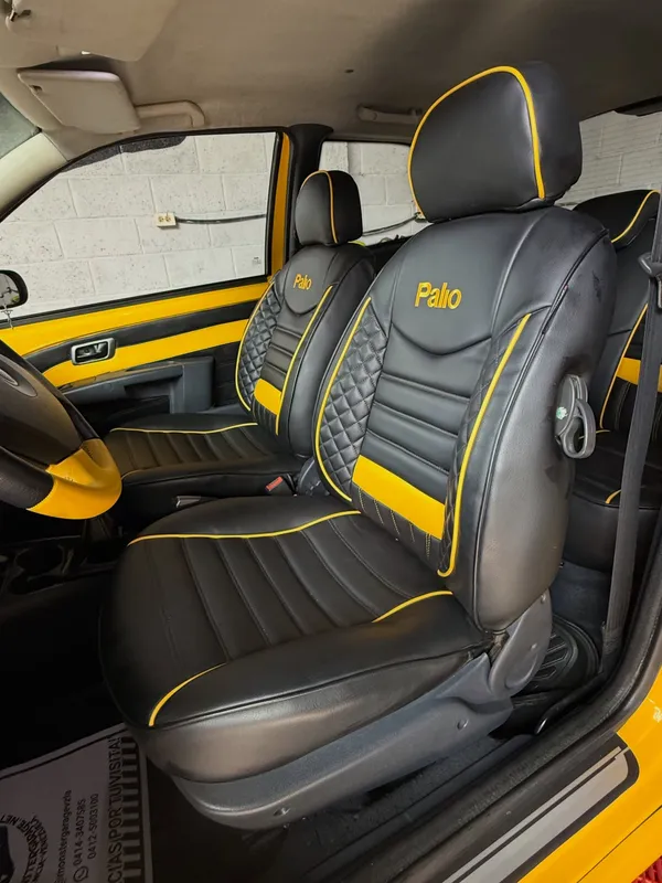 Fiat Palio negro y amarillo en Monster Garage Vzla, Valencia (foto 7)