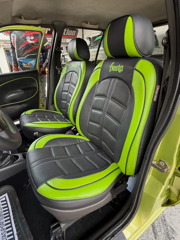 Ford Fiesta, negro y verde, en Monster Garage Vzla, Valencia