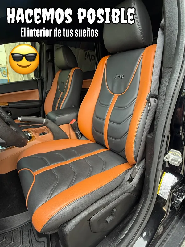 Jeep Grand Cherokee, negro y naranja, en Monster Garage Vzla, Valencia