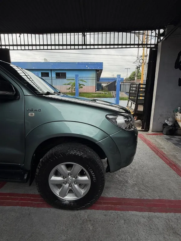 Toyota Fortuner verde: lateral después, en Monster Garage Vzla, Valencia